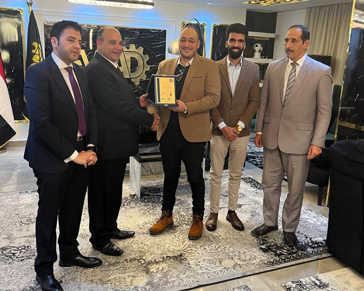The Team Quality team presenting an ISO certificate to Emdad for Heavy Mechanical Industries and Equipment